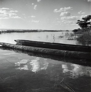 Dugouts on the river bank, in Senanga