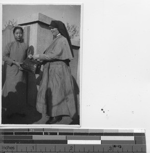 Sister Mercedes back from a sick call at Fushun, China, 1938