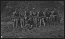 Group in swimming attire sitting at Big Lagoon, 1918