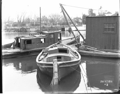 Boats/Boating - Calif - Stockton: boats tied up at dock along Stockton Channel, December 27, 1916