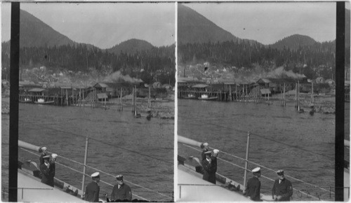 General view of Kitchikan from deck of U.S.S. Henderson, people welcoming Pres. Harding, Kitchikan, Alaska