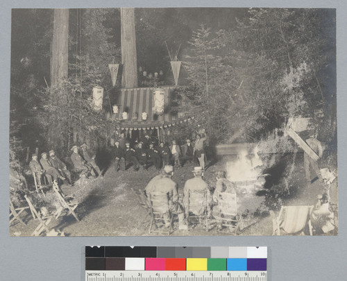 Group of men sitting around campfire, Bohemian Grove. [photographic print]