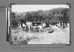 Missionaries crossing a river, Kyimbila, Tanzania, ca.1898-1914