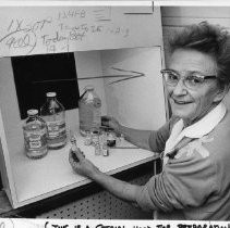 Carole Hoisington and various chemicals she mixes into three formulas, using a special hood for preparation of sterile formulas, to treat her illness