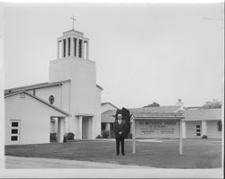 Minister Albert W. Foster in front of the Methodist Church of Petaluma, California, 1965