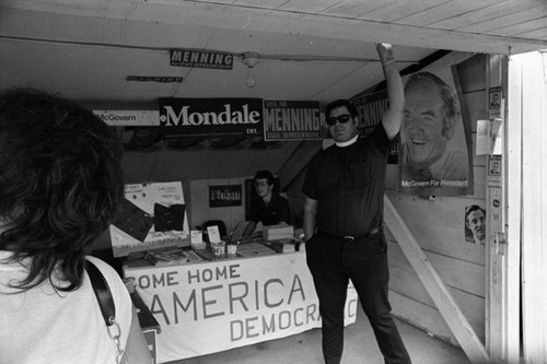 Clergyman and campaign posters, Minnesota, 1972