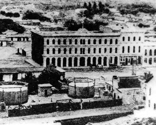 Photograph of first gas works and Pico House; tanks were built in 1867,the Pico House in 1871, and the Merced Theater in 1873