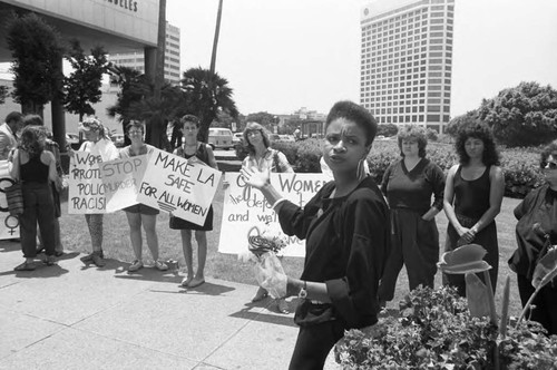 Take Back the Night Coalition members demonstrating at LAPD headquarters, Los Angeles, 1984