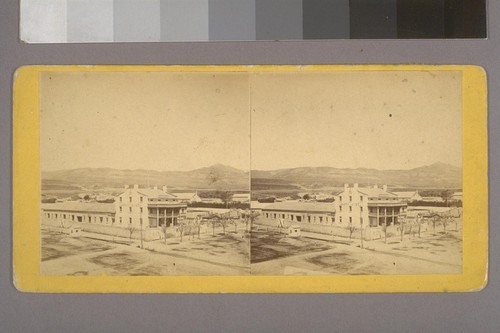 [Building with Mountains in distance]--Photographer: Savage & Ottinger--Place of Publication: Salt Lake City.--Photographer's series: Views in Utah, Idaho and Montana