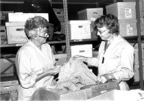Joy Spence and Margaret Gilling with textile collection
