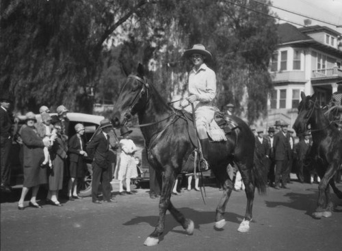 Parade participant on horseback, view 1