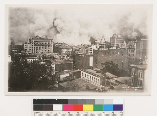 The heart of the city. [Fire burning in wholesale and South of Market areas. California Theatre at right. No. 136.]