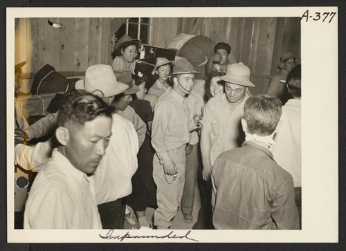 Arrival of persons of Japanese ancestry at the Colorado River Relocation Center, Camp 1. Photographer: Clark, Fred Poston, Arizona