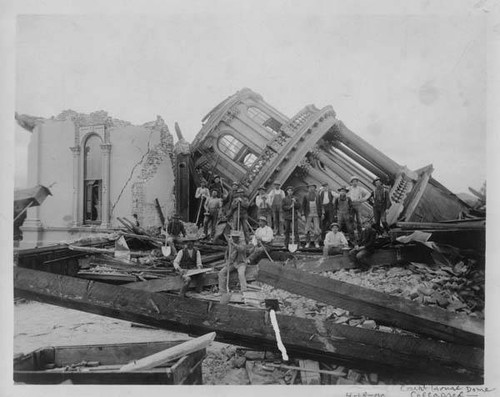 Large work crew and the toppled dome of the Sonoma County Courthouse