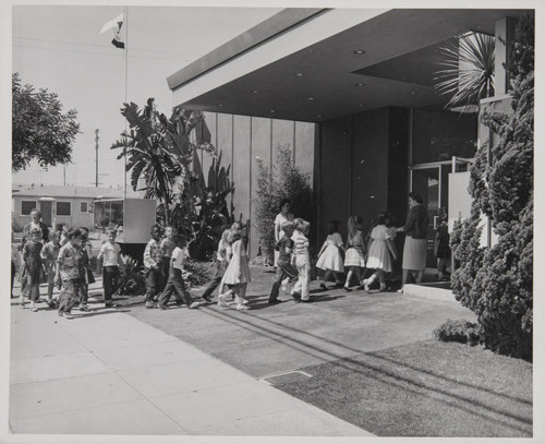 A group of youngsters entering the Fairview Branch Library