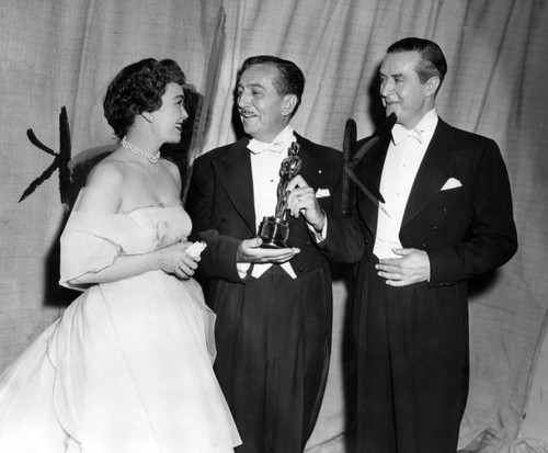 Walt Disney receives Oscar from Jane Wyman