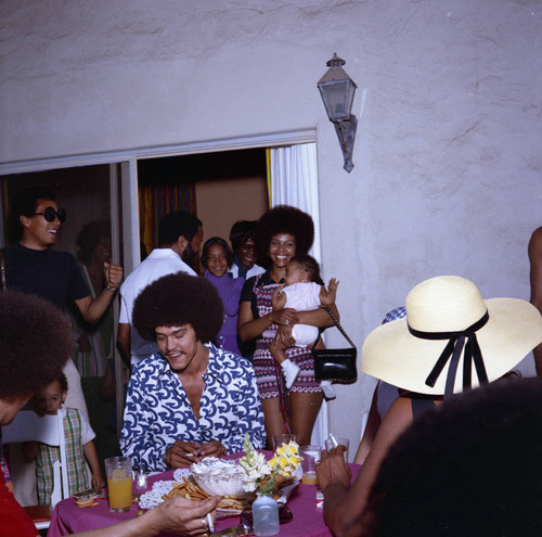 Smokey Robinson with Berry Gordy at his house party, Los Angeles