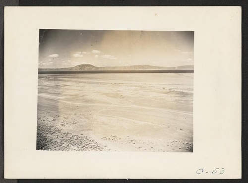 Tule Lake, Calif.--A panoramic view of the agricultural land which will be cultivated by evacuee farmers at this War Relocation Authority center. Tule Lake is shown in the background. (See also C-52, C-54, and C-55 for complete panorama). Photographer: Albers, Clem Newell, California
