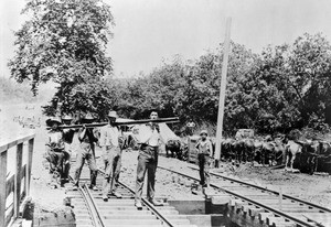 Workers laying the last rails of the San Gabriel Railroad, Highland Park, Los Angeles, 1885
