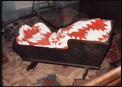 Snapshot of cradle in reconstruction of Luther Burbank's birthplace at Greenfield Village, Michigan, 1985
