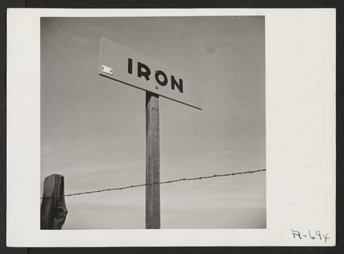Slap the Jap with Iron Scrap. Burma Shave sign on highway. The population of this farming area was made up largely of people of Japanese ancestry prior to evacuation. Resentment of them is now widespread. Photographer: Stewart, Francis Loomis, California