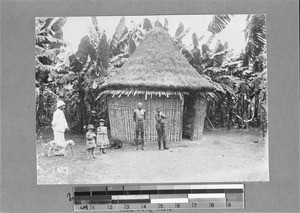 Missionary Zickmantel visits a family, Ilolo, Tanzania, 1898-1922
