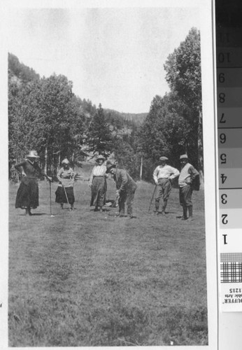 Playing golf in the meadow at the Mono Lake summer camp