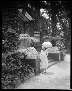 Estelle Doheny, main entrance, Doheny Mansion, Los Angeles, Calif., ca. 1902-1920?