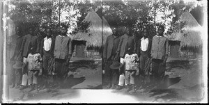 African boys standing in front of a hut, Limpopo, South Africa