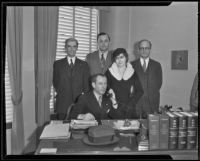 Ex-Judge Guy F. Bush and wife Leila LeGrand with attorneys Hahn, Holbrook and Bole at Hahn's office, Los Angeles, 1935