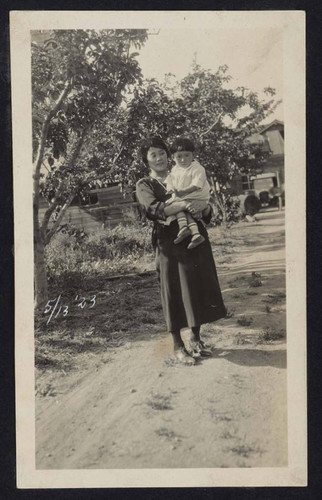 Woman and child on farm