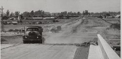 Building the US 101 freeway through Petaluma, California, 1955