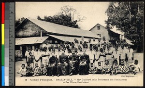 Students standing and seated outdoors with their instructors, Brazzaville, Congo, ca.1920-1940