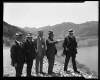 William Mulholland and 4 other men on the east bank of the St. Francis Reservoir, San Francisquito Canyon, circa 1926-1928