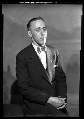 Portrait of a man in bow tie and suit