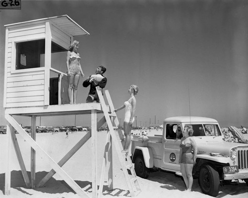 Lifeguard tower and truck at Huntington Beach State Park, Huntington Beach Chamber of Commerce publicity photograph, July 1, 1952
