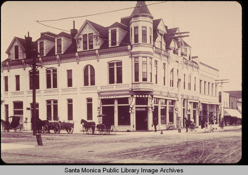 Santa Monica Bank at Third and Oregon Avenue (now Santa Monica Blvd.) with carriages parked on Oregon Avenue