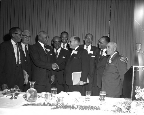 Norm O. Houston Shaking Hands, Los Angeles, 1959