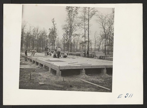 Volunteer workers constructing apartments for the administrative staff. Photographer: Parker, Tom McGehee, Arkansas