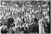 Crowd watches a football match bewteen the Loyola Marymount Lions and the the Santa Clara Broncos, Los Angeles, 1937