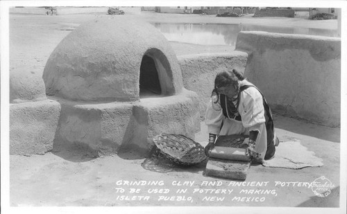 Grinding Clay and Ancient Pottery to be Used in Pottery Making, Isleta Pueblo, New Mexico