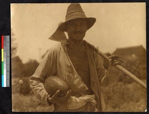 Farmer holding a watermelon and a hoe, China, ca.1900-1932