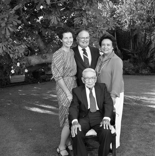 Dr. H. Claude Hudson posing with family during his 100th birthday celebration, Los Angeles, 1986