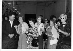 Don Hallberg, of O. A. Hallberg & Sons apple products with a group of ladies, representing schools and businesses touring the Hallberg cannery and orchards, about 1960