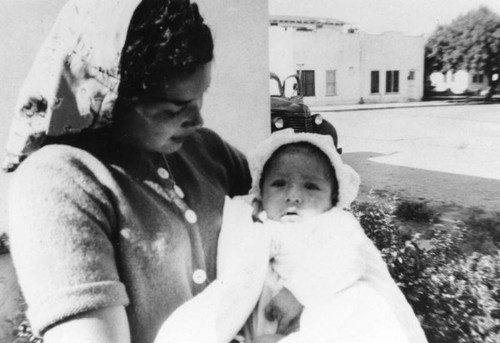 Mexican American woman with baby