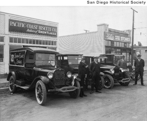 Pacific Coast Biscuit Company storefront, delivery vehicles, and employees