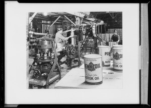 Canning machine and cans, Southern California, 1935