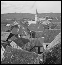 [Ammerschwihr: view over rooftops to church tower]