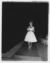 Layered strap dress modeled in the Sword of Hope fashion show at the Flamingo Hotel, Santa Rosa, California, 1960