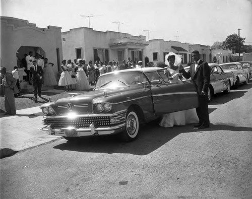 Couple at car, Los Angeles, 1958